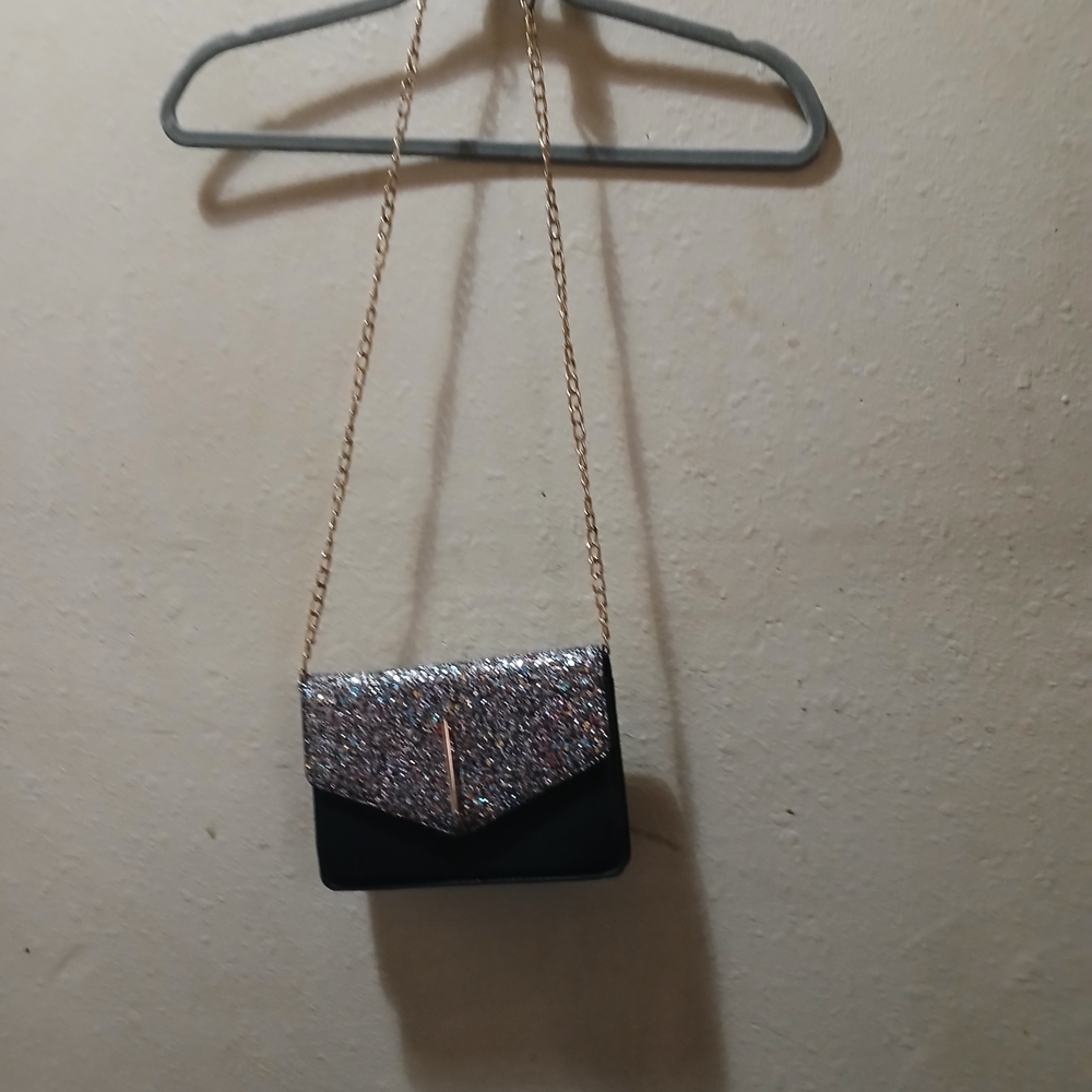 Target Black and Silver Glitter Clutch With Gold Bar In Front